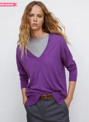15. MANGO Cable Knit Sweater with Side Slits
