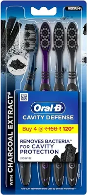 4. Oral B Cavity Defense 123 Black Manual Toothbrush for adults with charcoal extract